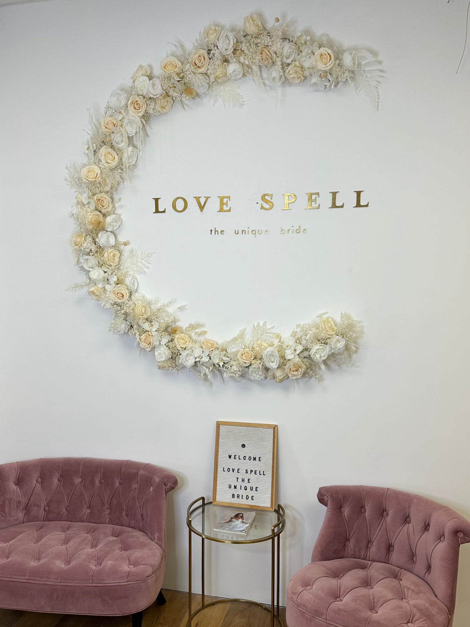 bridal shop floral wall decor with roses