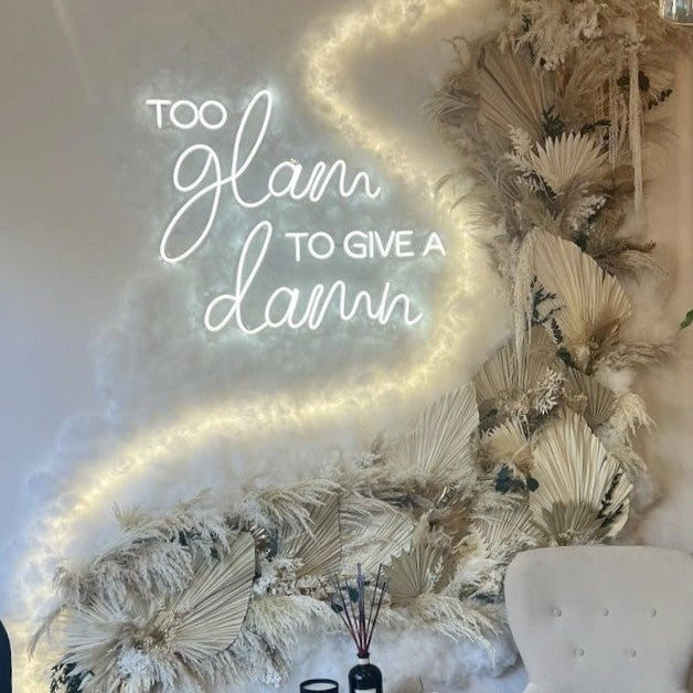 dried flower pampas wall with cloud wall and neons in London salon