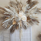 gold and neutral cram pampas wall arrangement