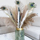 Eucalyptus and pampas grass dried flower bouquet with peacock feathers