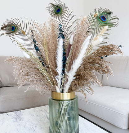Eucalyptus and pampas grass dried flower bouquet with peacock feathers